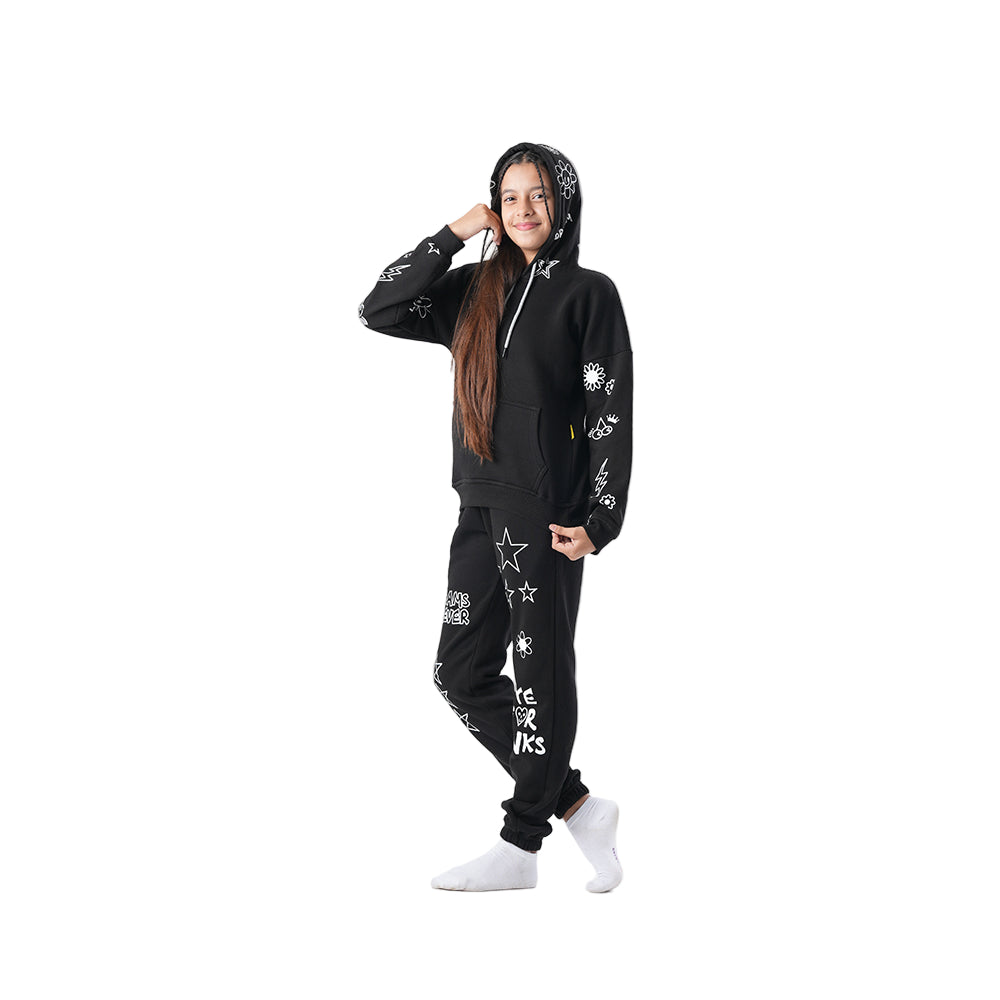 Person wearing a black hoodie and pants with white text and designs on a white background