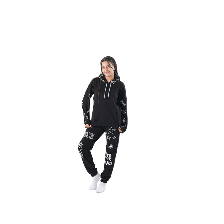 Person wearing a black hoodie and jogger set with white text and graphics on a white background