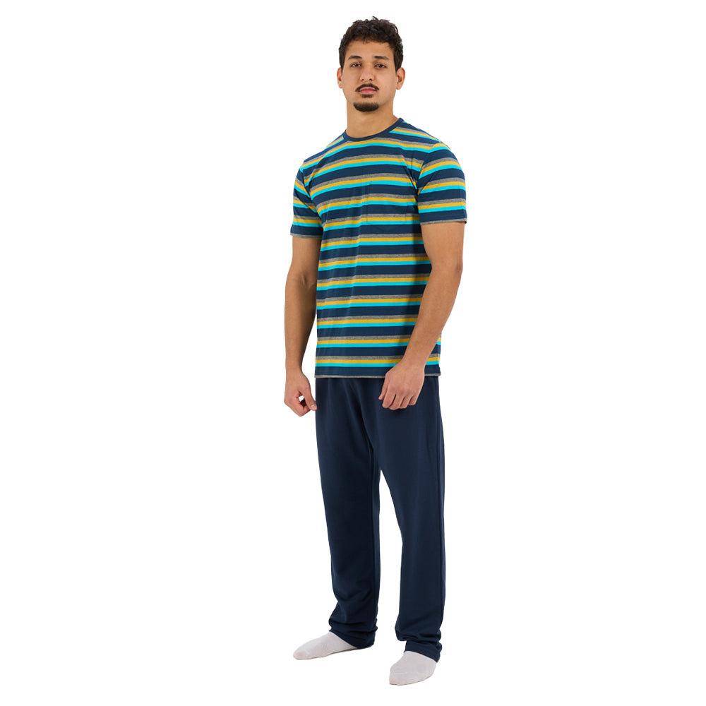 Man wearing a striped shirt and dark pants on a white background